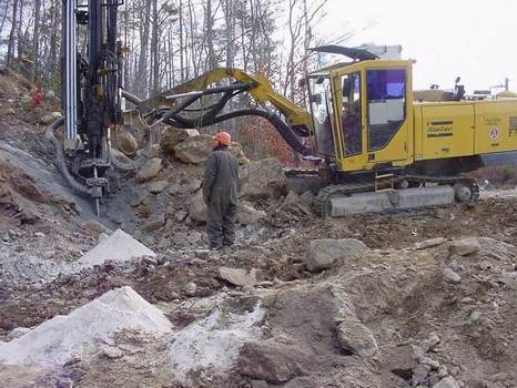 Trackexplores pegmatite to 60'